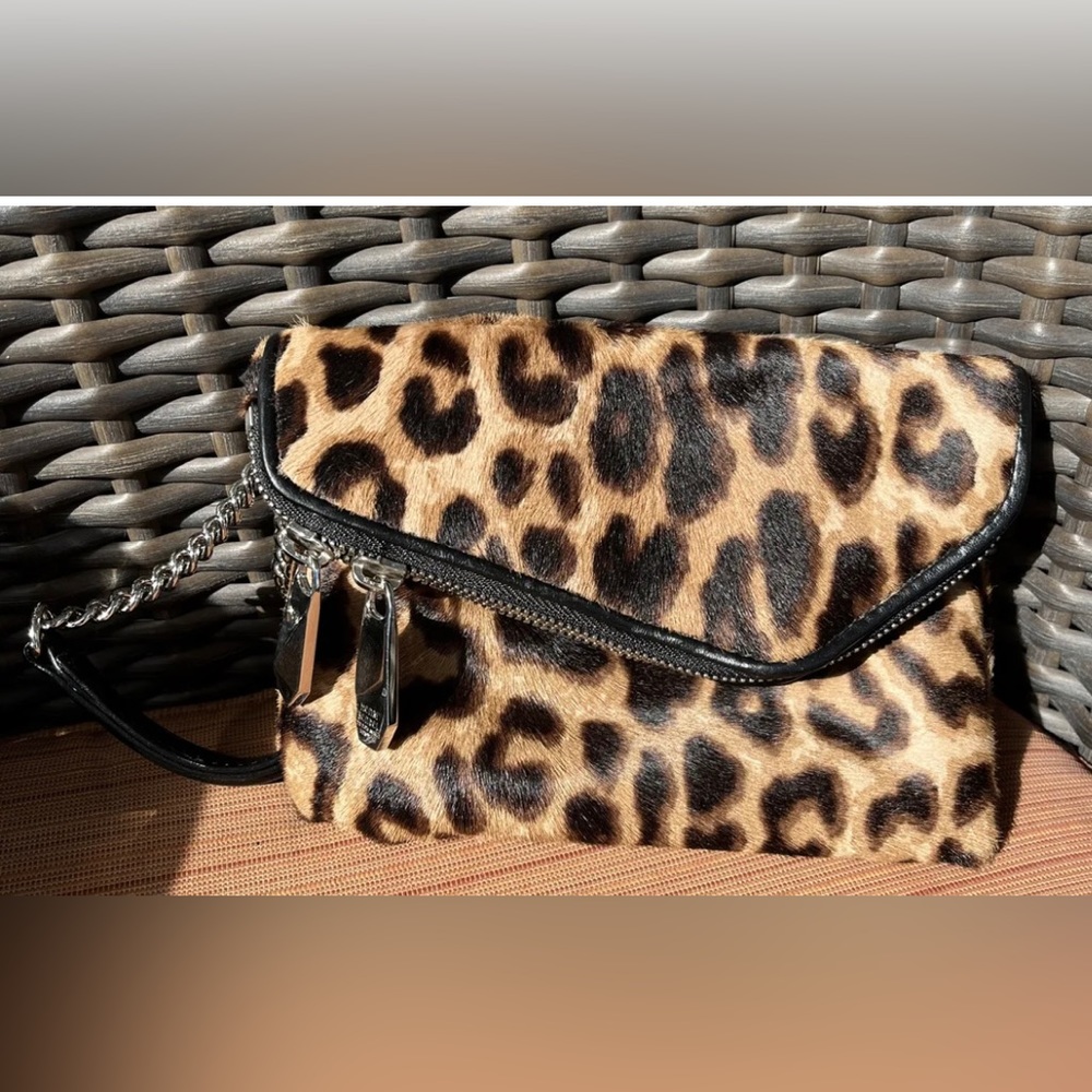 HENRI BENDEL Lepoard print wristlet asymetrical calf hair
